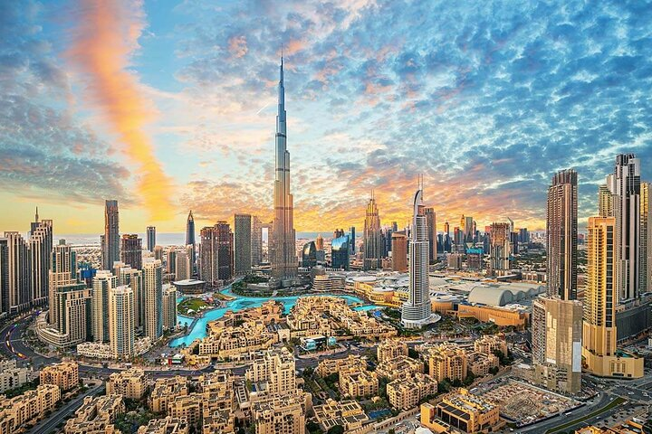 Explore Dubai's stunning skyline where ancient wonders meet modern marvels. Discover the iconic Burj Khalifa and vibrant markets immersing yourself in the unique blend of history and innovation.
